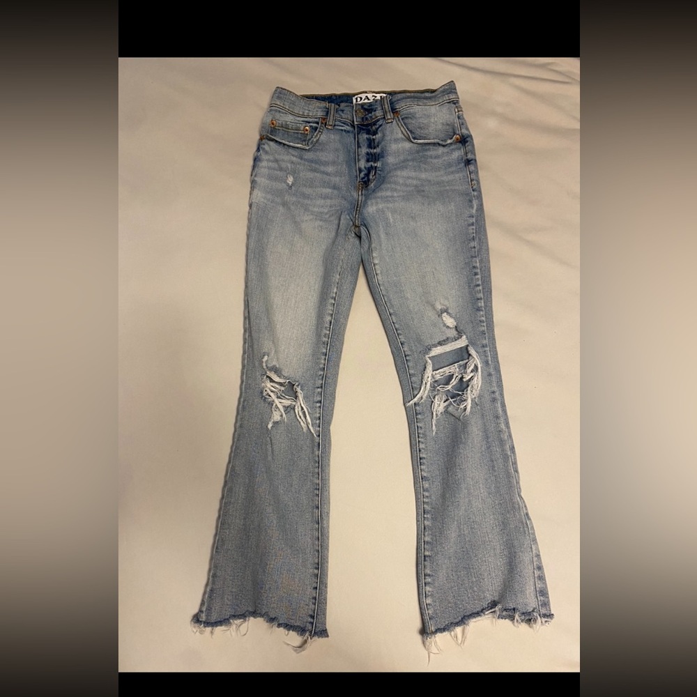 Women's Distressed Light Blue Jeans
